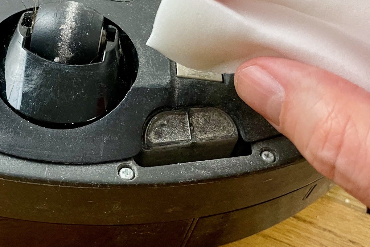 how-to-clean-a-roomba-s-charging-contacts-and-cliff-sensors-techhive