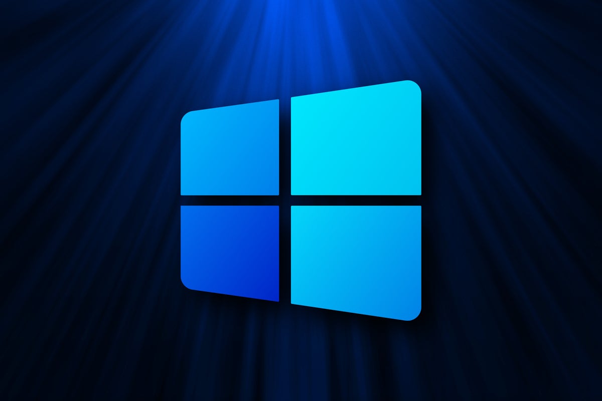 Microsoft Windows 10X logo, with a blue spotlight background.