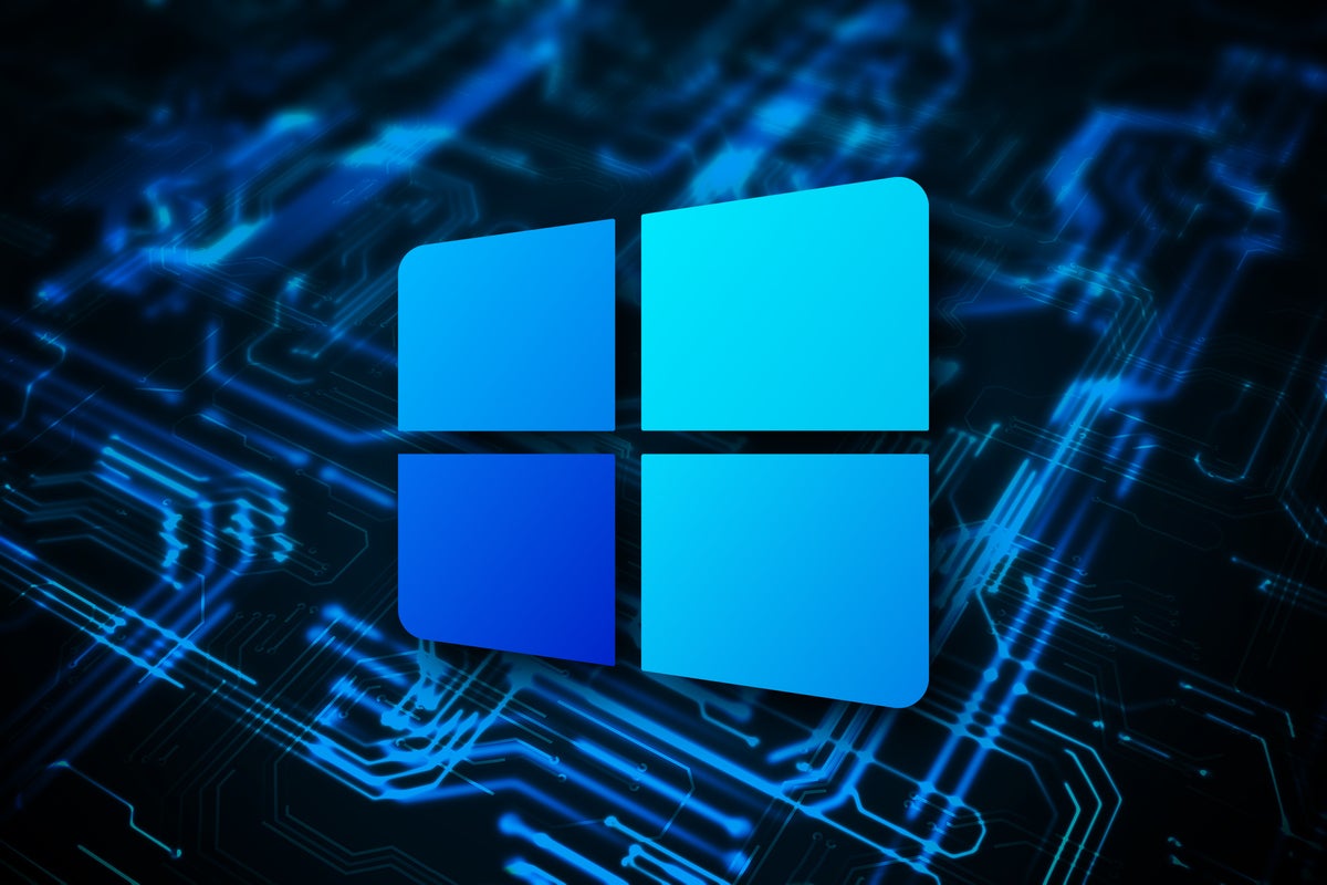 Microsoft Windows 10X logo, with glowing blue circuits in the background.