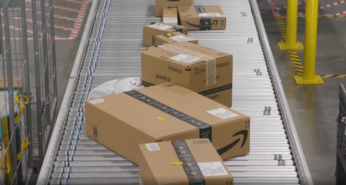 amazon packages on conveyor belt