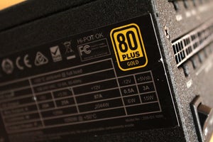 Close up of 80 Plus Gold rating logo on an EVGA 1050W power supply