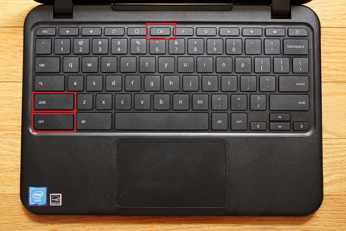  A screenshot of a laptop keyboard with the keys highlighted that are used to take a screenshot on a computer.
