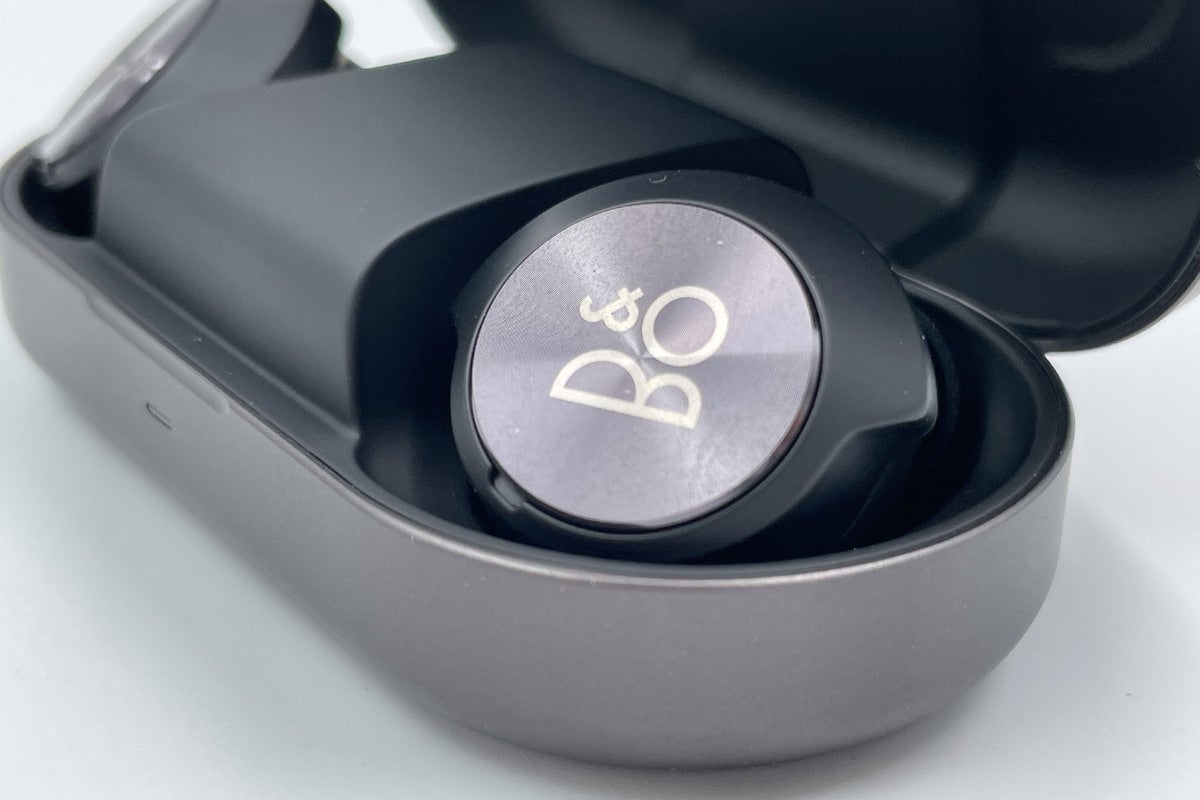 Detail view off the Beopaly EQ earbud n the charging case. Notice how low-profile the case is.