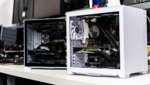 o11 Air Mini on a table with the o11d mini slightly behind it