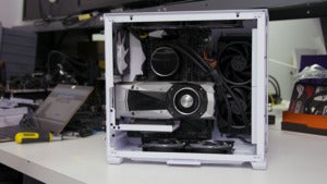 O11 Air Mini on a table with components inside.
