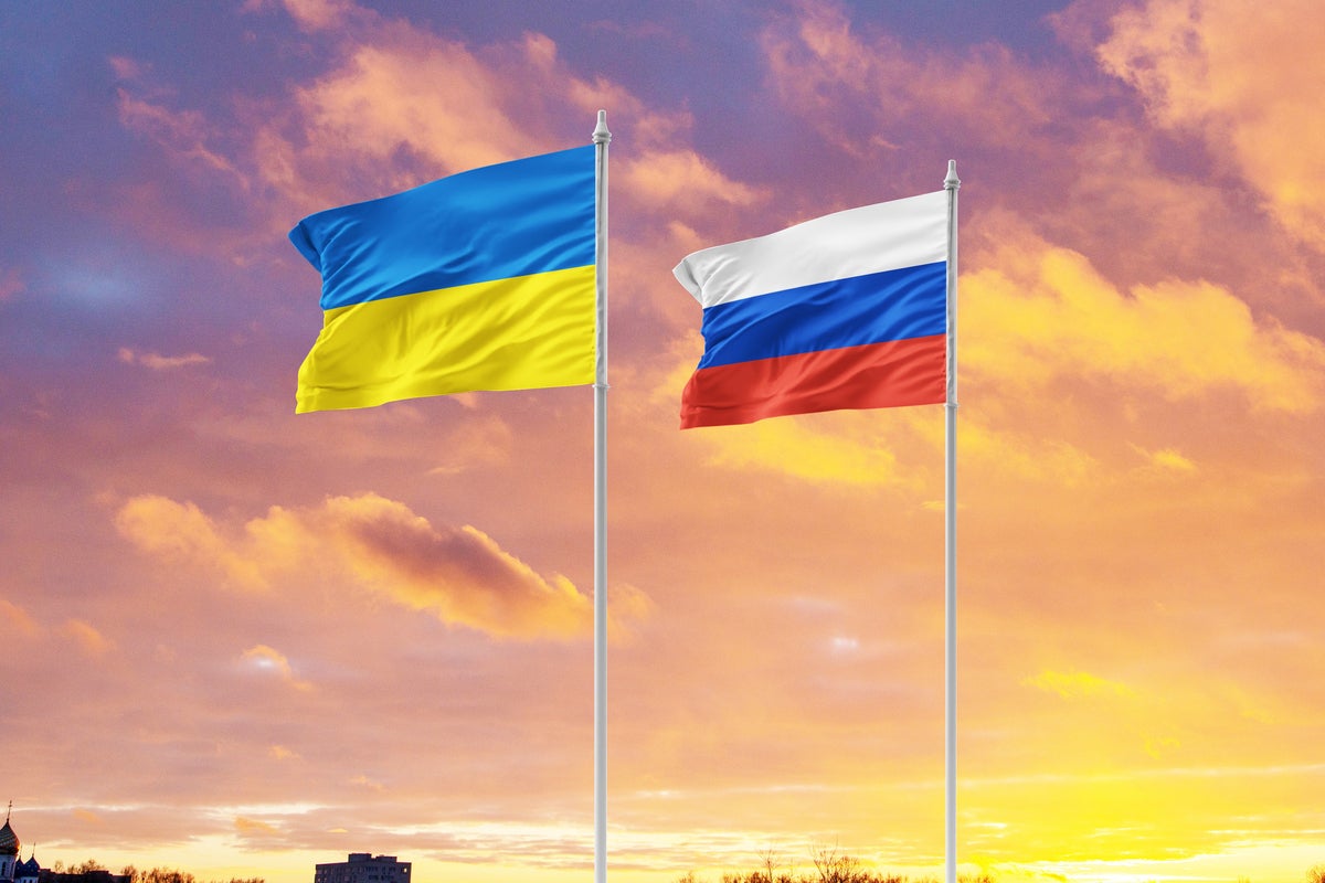 shutterstock 2112953282 ukraine russian flags