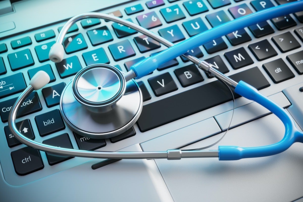 stethoscope on laptop keyboard picture id1257741705