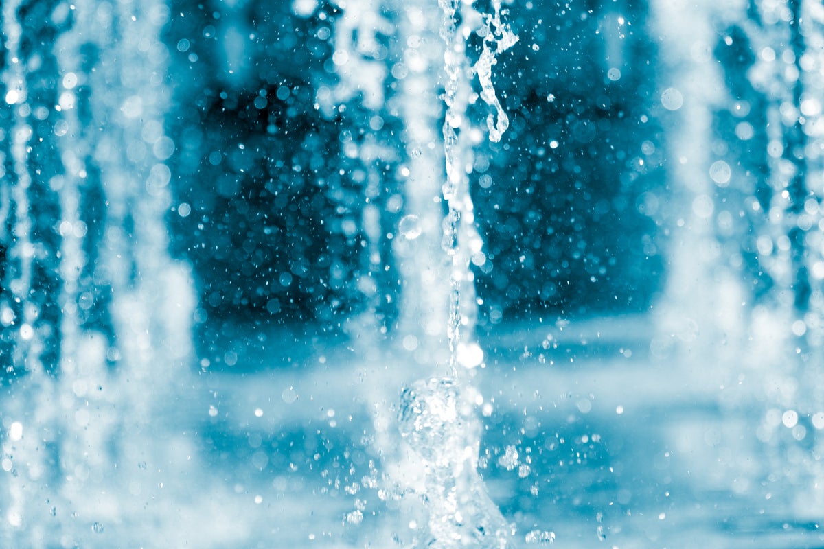 shutterstock 440449237 gush of water from a fountain