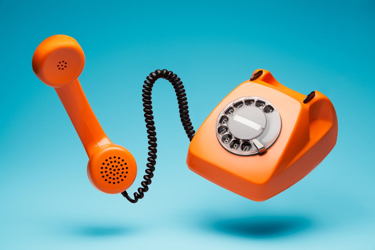 Red rotary phone, ringing, calling, callback