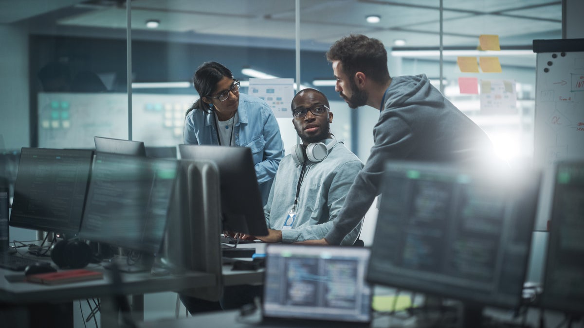 Diverse Group of Professionals Meeting in Modern Office: Brainstorming