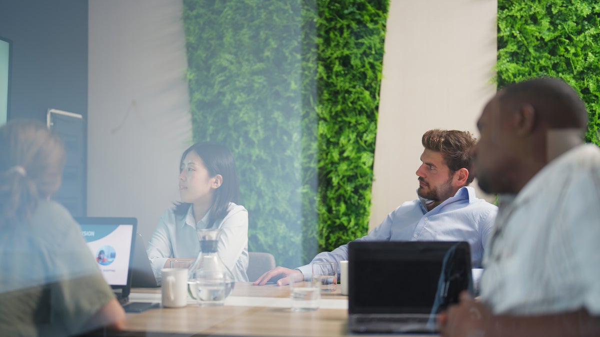 Business people having business meeting in meeting room in modern office working space