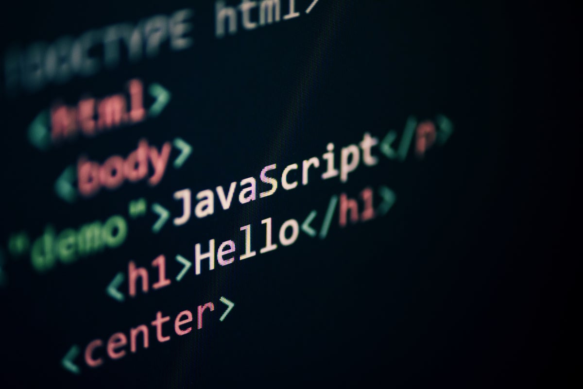 shutterstock 1361674454 JavaScript Hello code in programming text editor