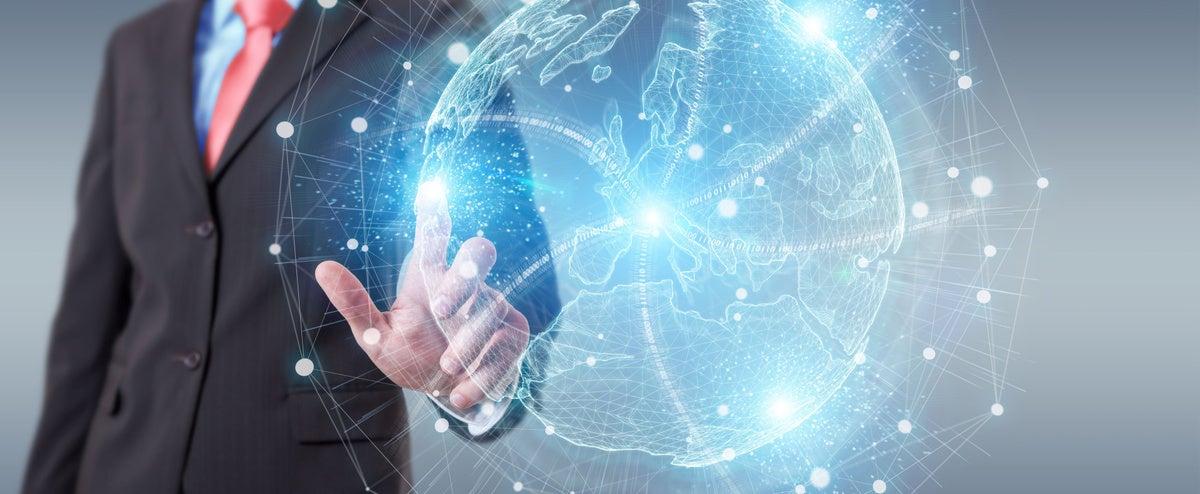 Businessman on blurred background using global network map hologram