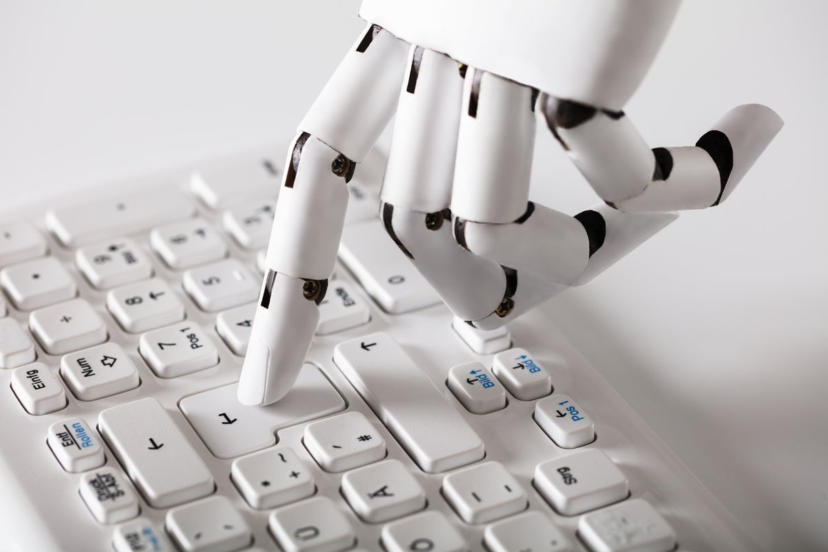 Robotic hand typing on keyboard