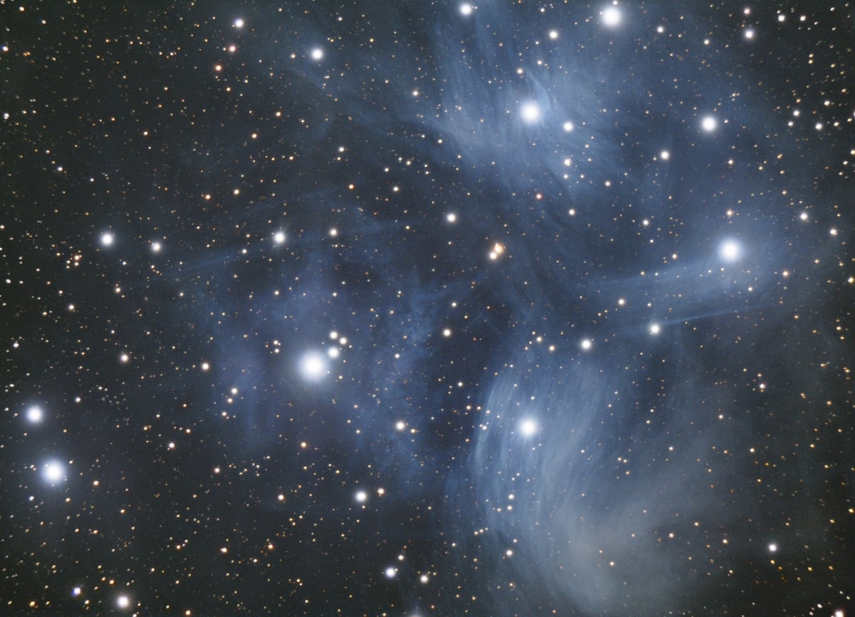 shutterstock offset 2244835187 the Pleiades star cluster aka the Seven Sisters a reflection nebula