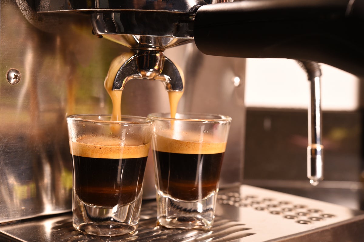 shutterstock 236850028 espresso coffee machine making two cups espresso coffee