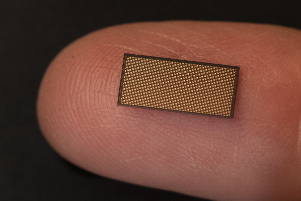 Intel Loihi 2 machine learning brain chip on a fingertip