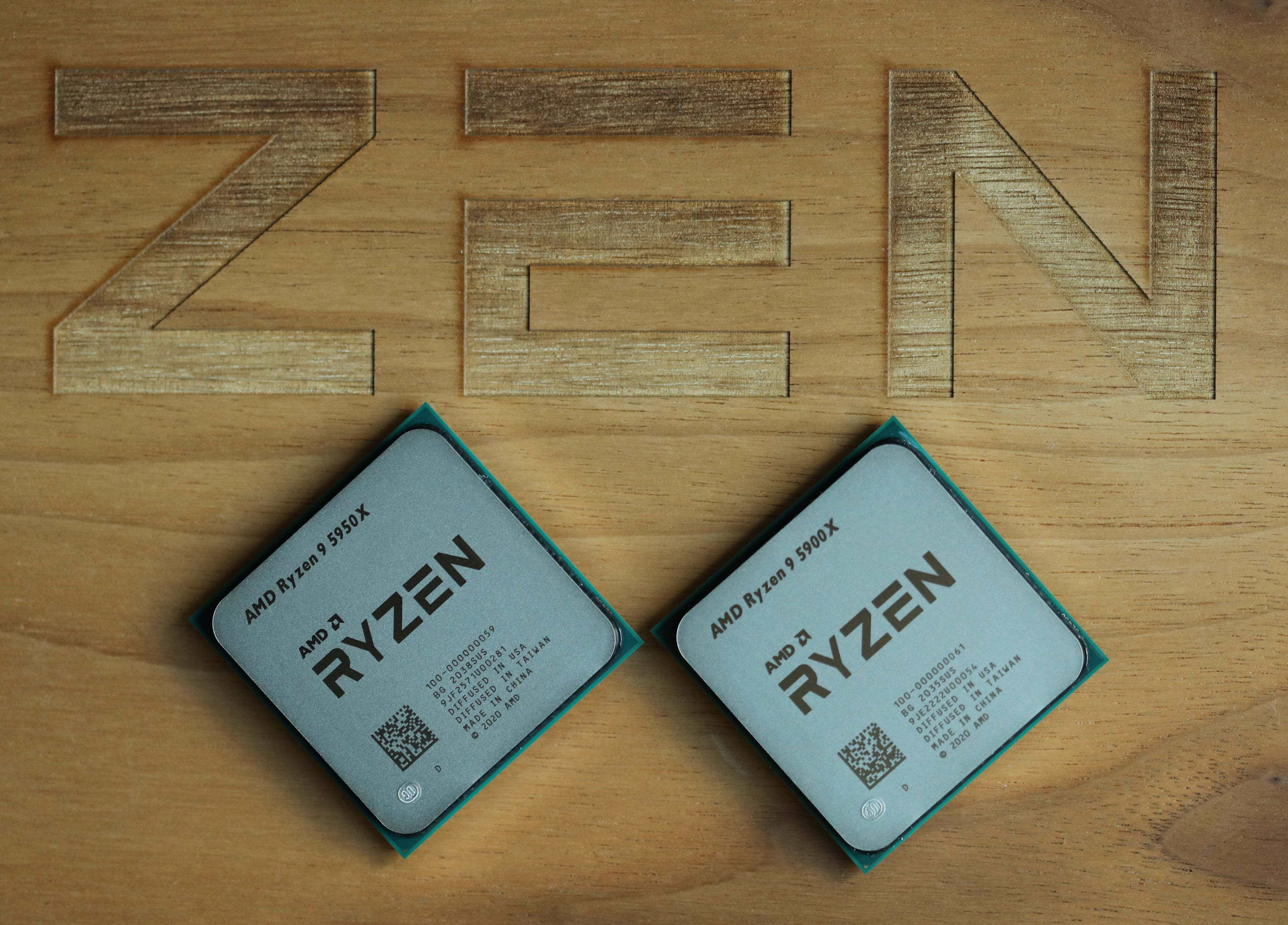 Ryzen 5950X and 5900X on a wood box with the word Zen on it