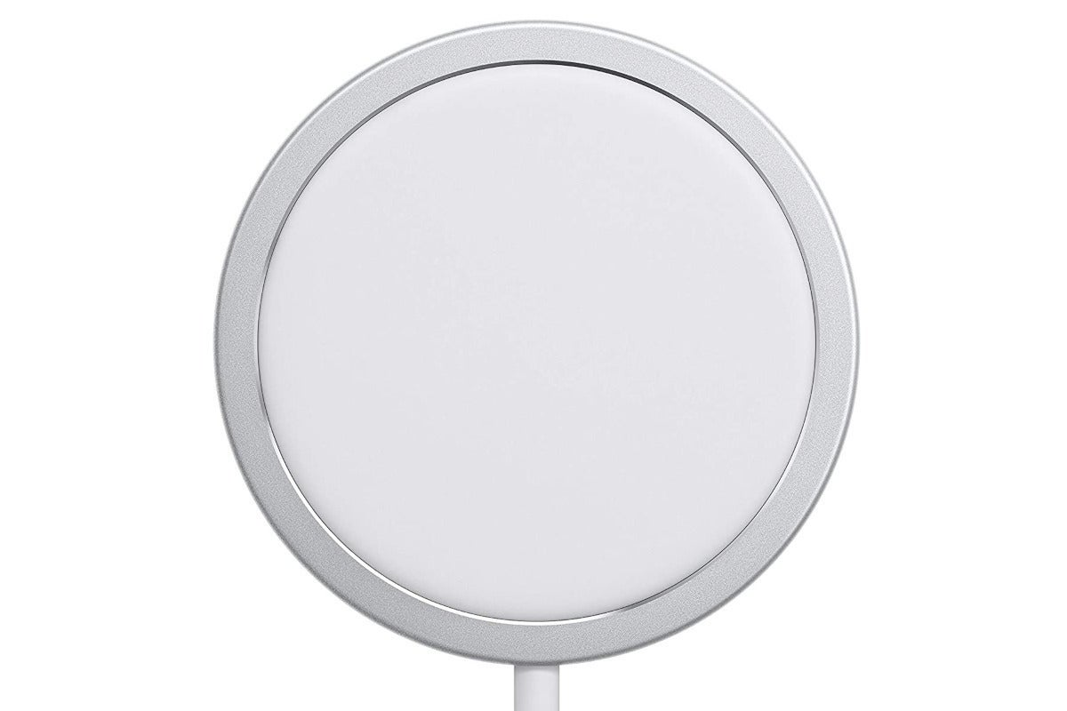 Apple's MagSafe circular charger on a white background.