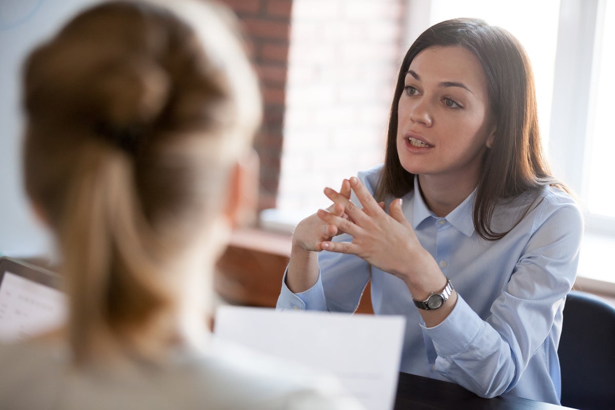 Businesswoman negotiating in meeting