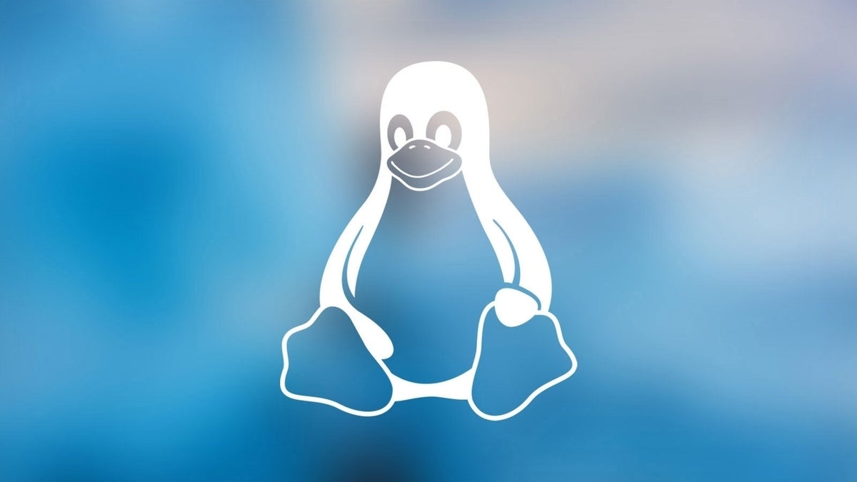 Linux penguin in relief against a blue background