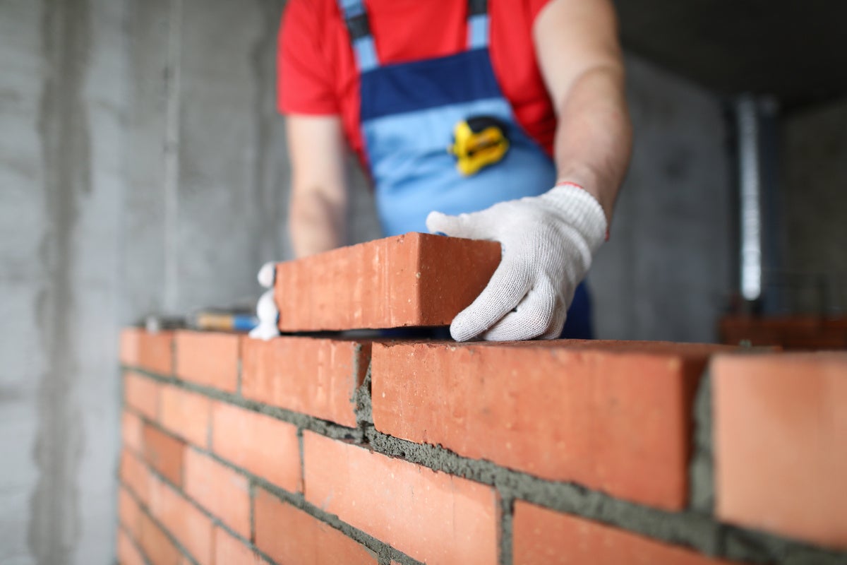 Building Blocks mason laying bricks