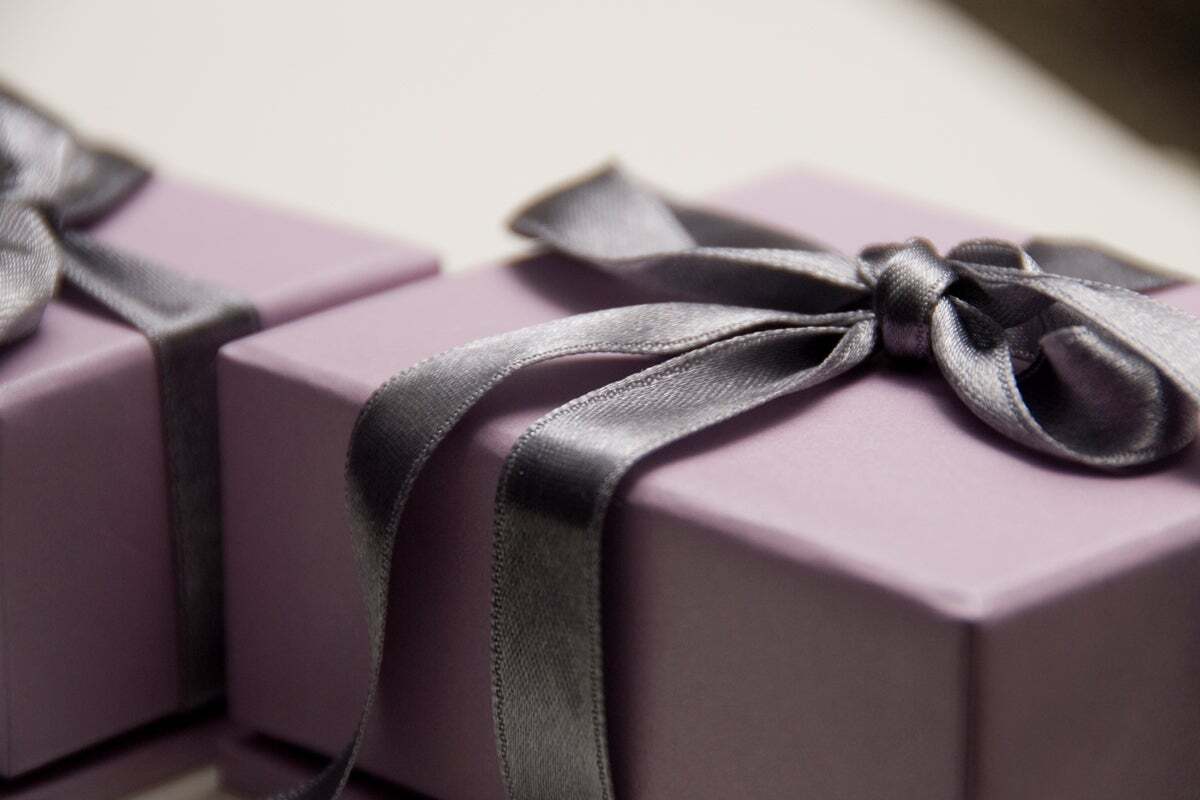 purple gift boxes with gray ribbon gifts surprise